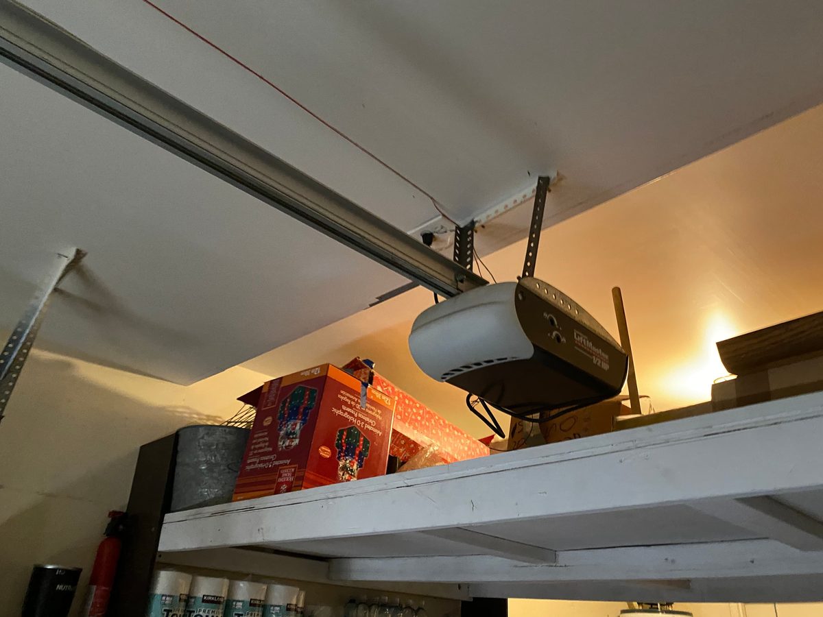 Old worn LiftMaster opener before replacement