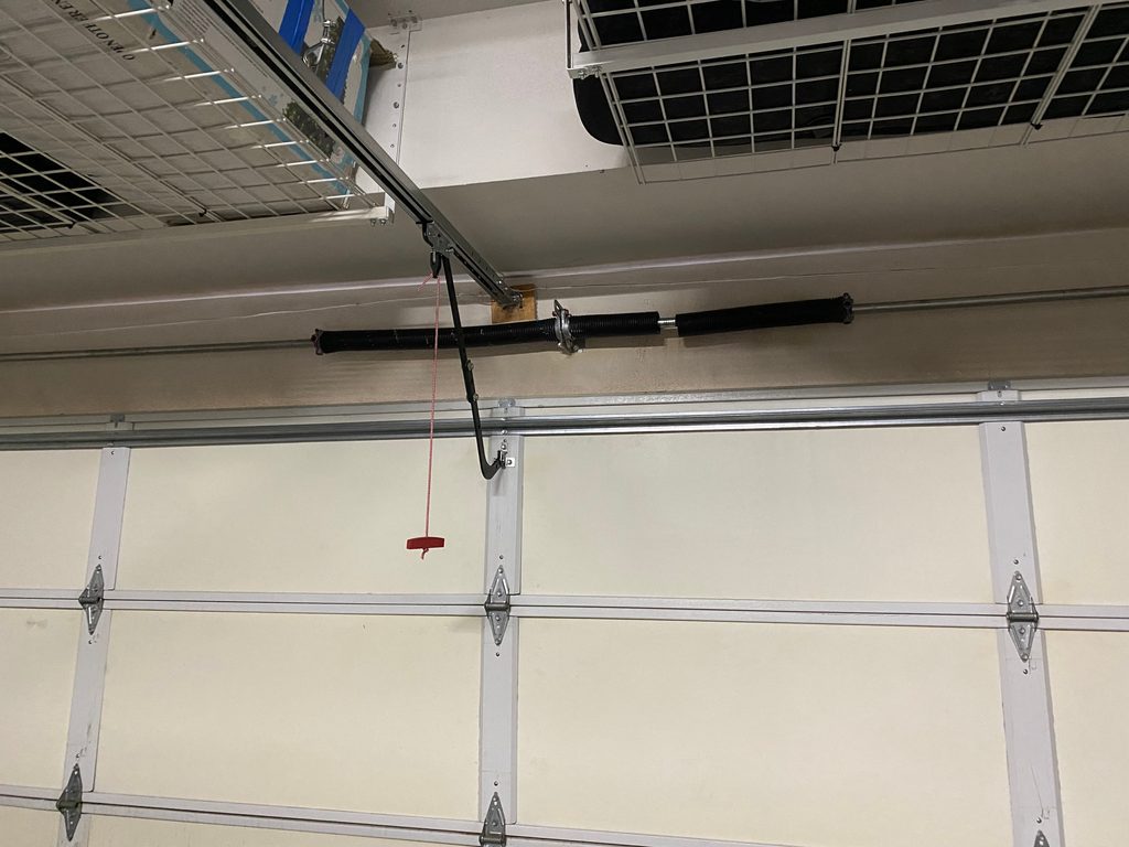 Broken torsion spring before replacement, Mira Mesa