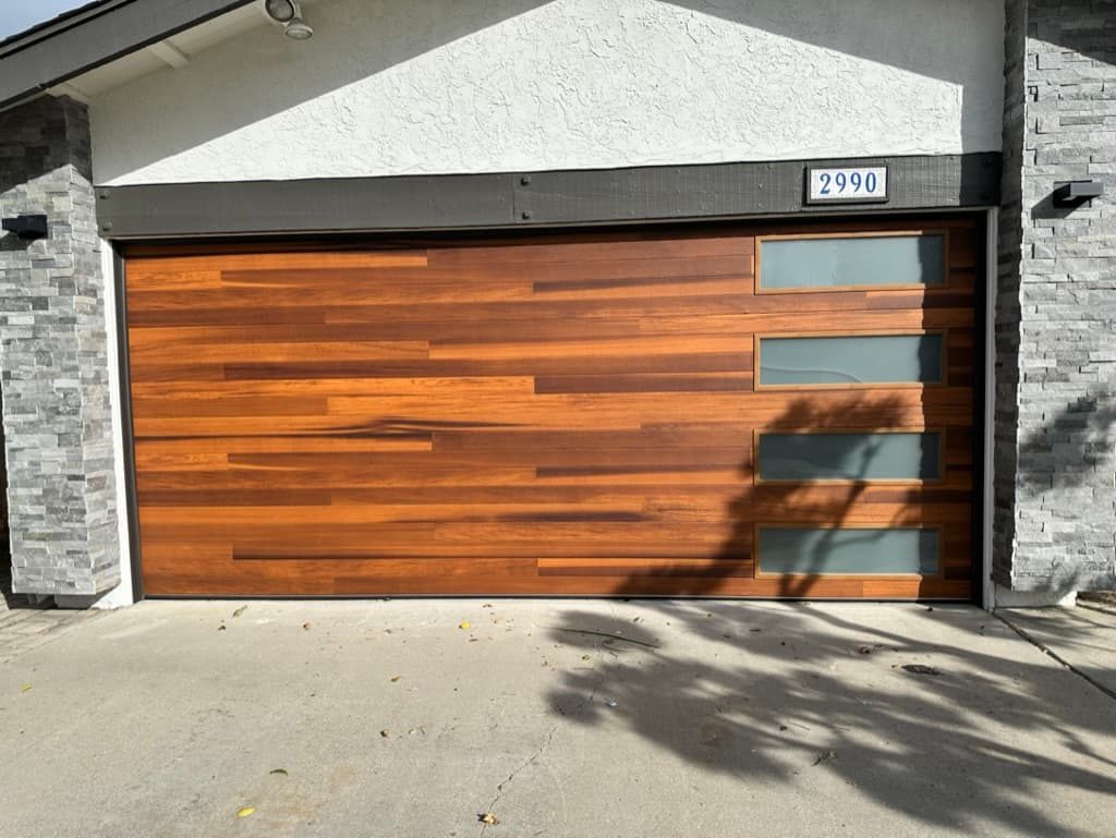 Walnut wood-look carriage garage door with windows, North Park