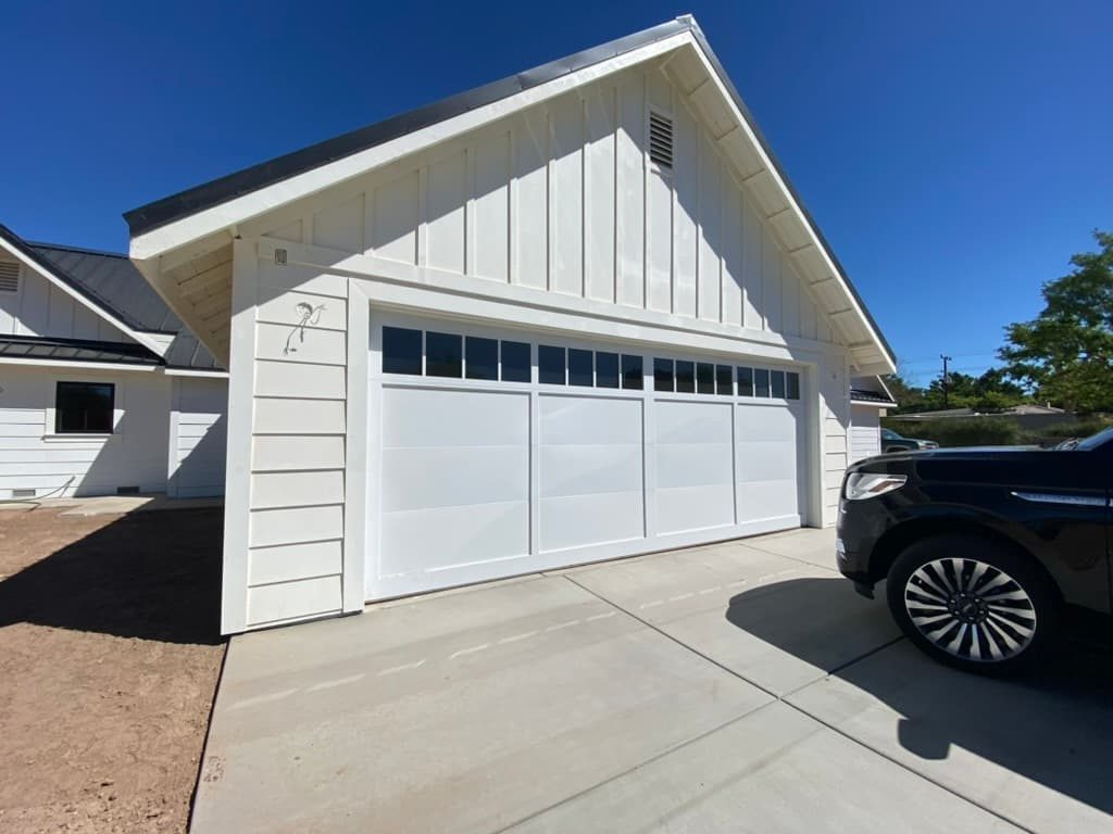 Cedar horizontal-slat garage door with black windows, Mira Mesa