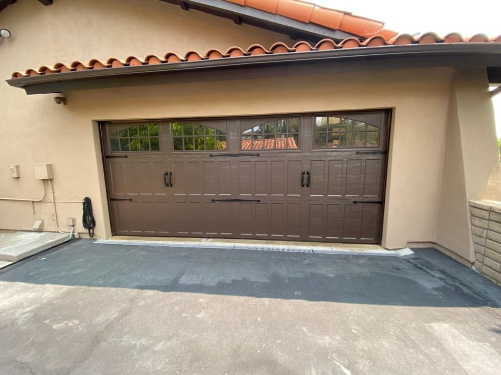 Tigerwood modern garage door with frosted side windows, El Cajon