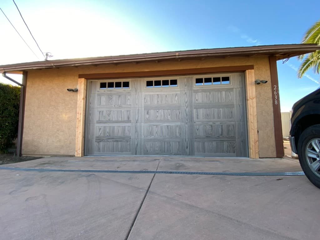 Cedar modern garage door on a mid-century home, Serra Mesa
