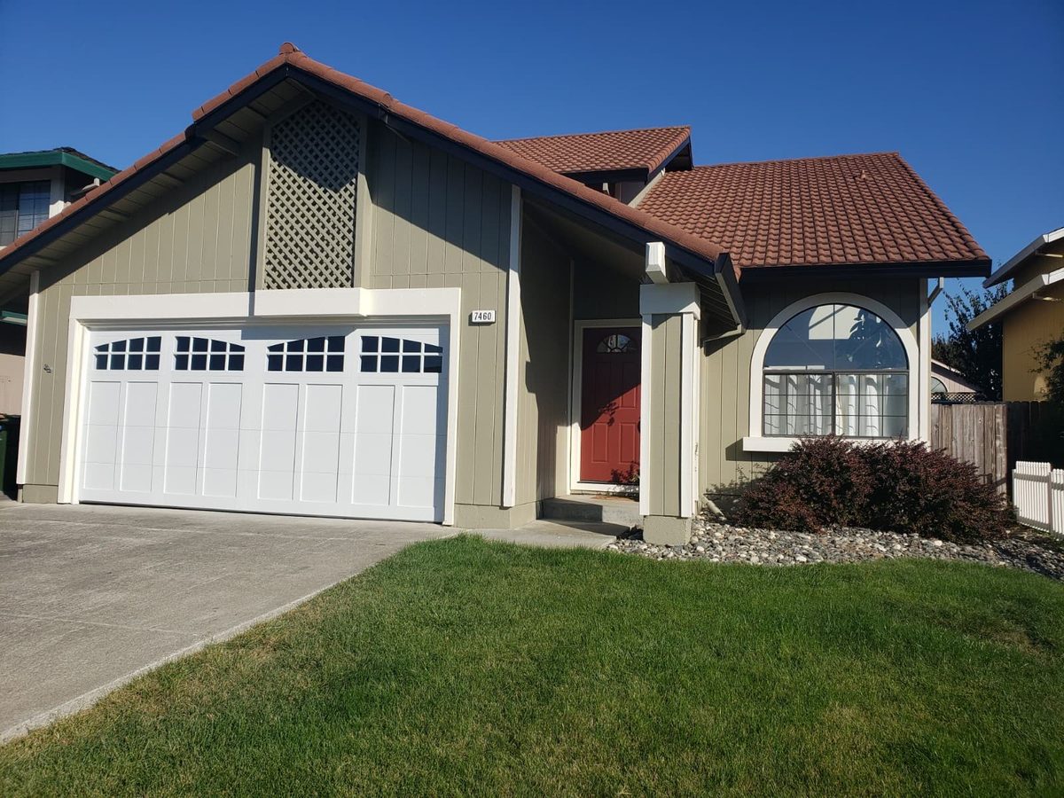 Gray modern garage door with arched windows, Mira Mesa