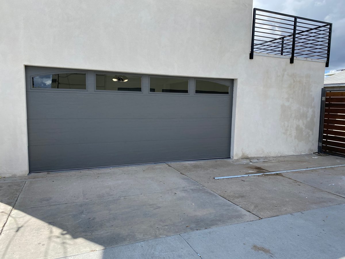 Dark bronze frosted-glass garage door, North Park