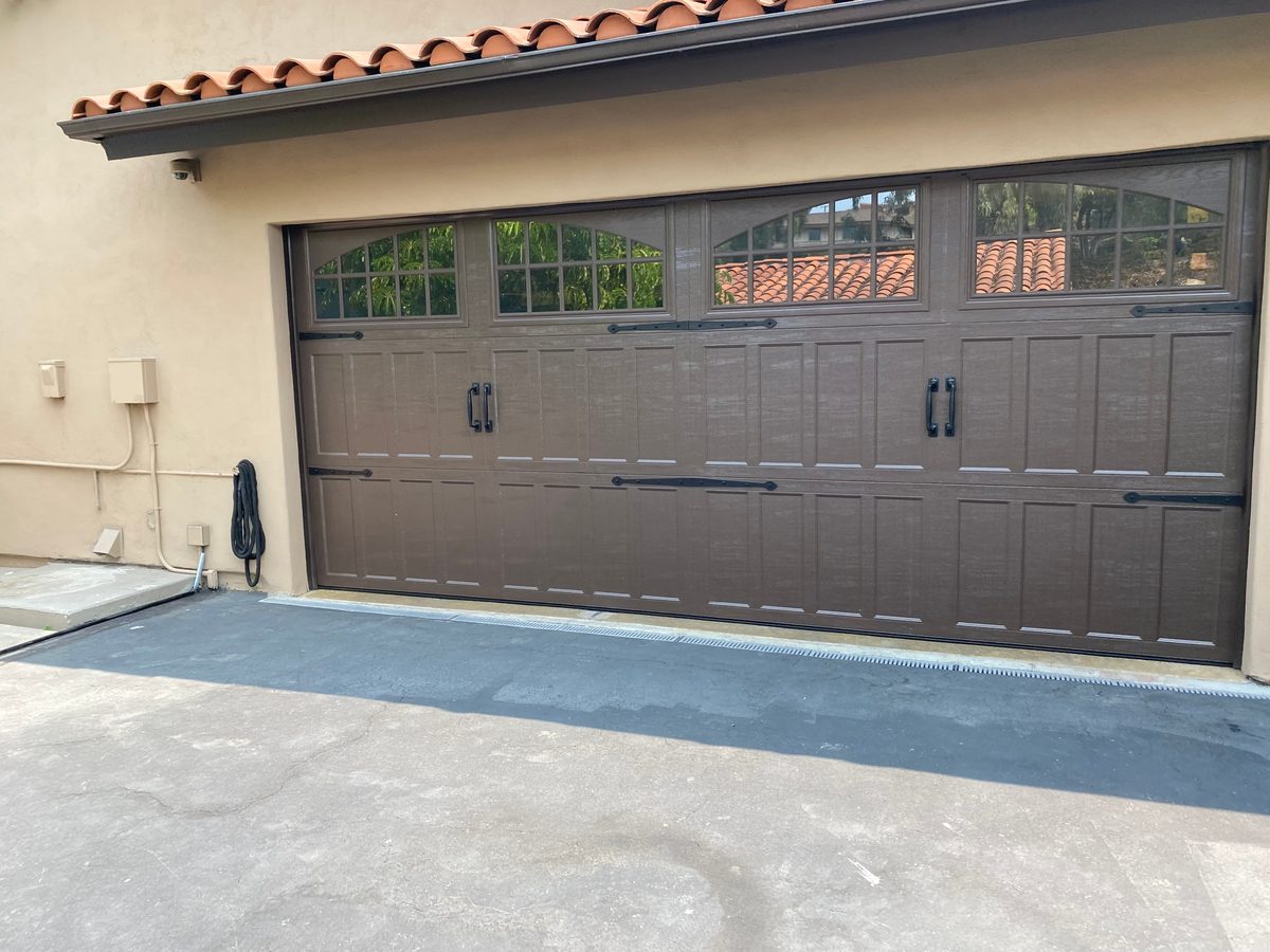 White garage door, same-day repair with our truck on site, Oceanside