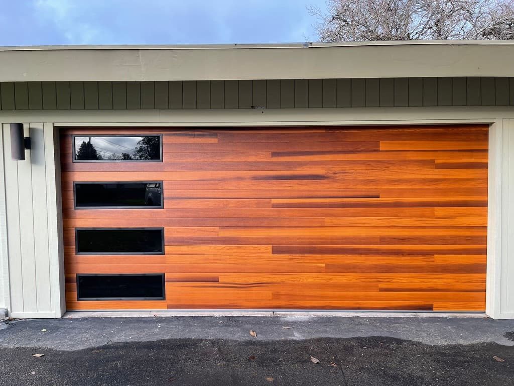 Gray woodgrain modern garage door with side windows, Mt Helix