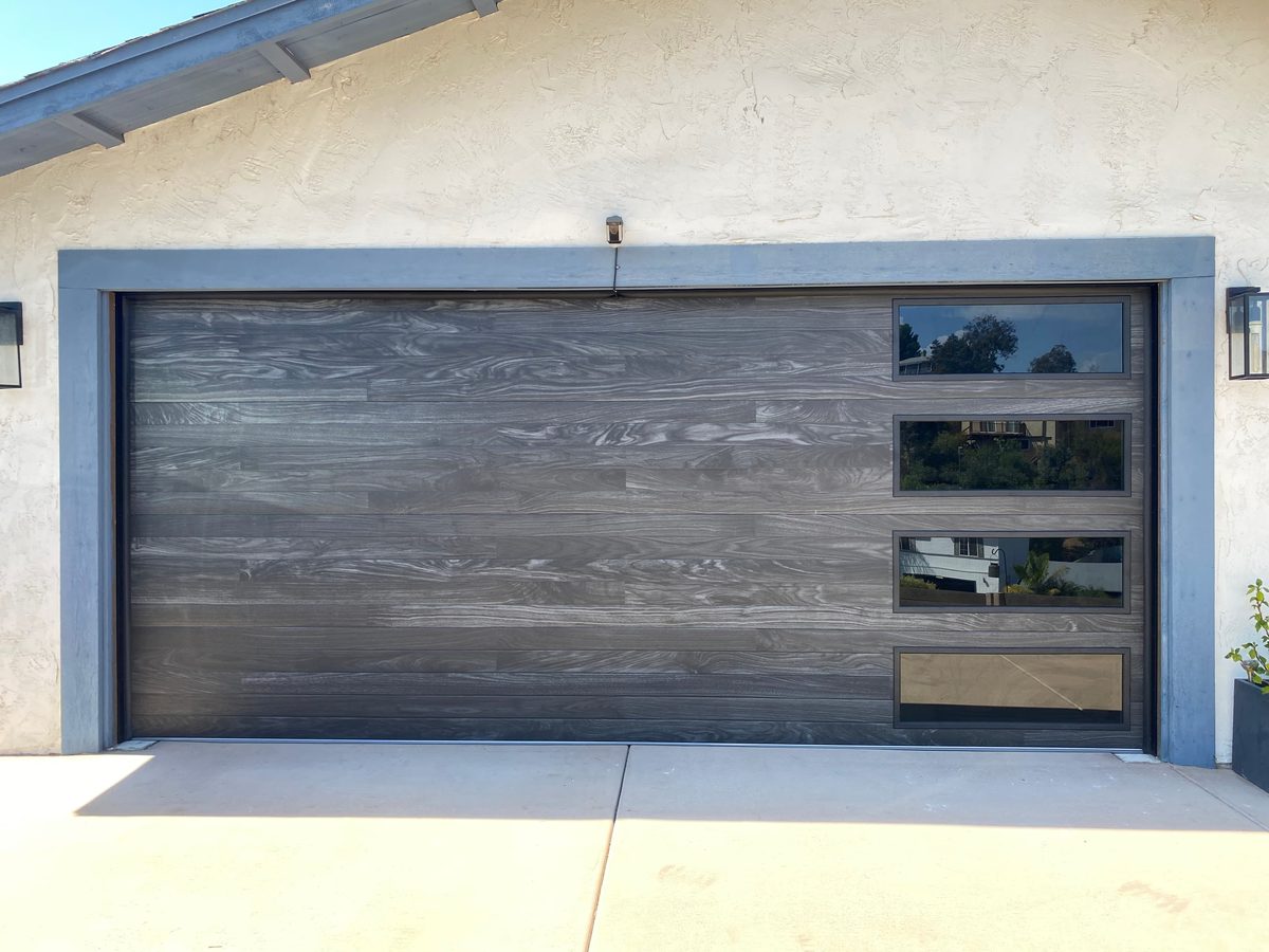 White Spanish carriage garage door with arched windows, Clairemont